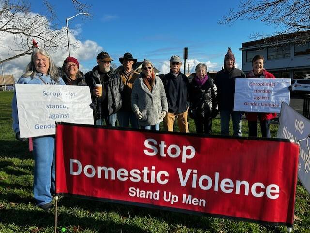 Heather Spaulding  Staff photo
Soroptimist stand with The Stand Up Men