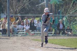 Staff photo/ Isabel Ashley
Harrison Edge, freshman, heads to first after three foul pitches