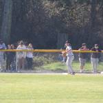 Staff photo/ Isabel Ashley
Henry Pope, freshman, looks to pass the ball after getting an out at third
