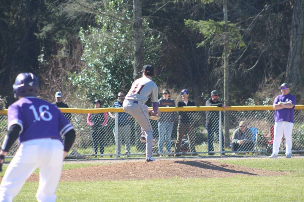 Staff photo/ Isabel Ashley
Pierce Klein, junior, winds up a pitch