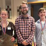 Contributed photo by Paul Mayer
Friday Harbor Middle School students and teacher: Hazel Johnson, first place winner; teacher, Michael McKinnon; Elliot Roach, second place winner.