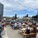 Staff photo / Isabel Ashley 
Islanders enjoy food, beverage, and sunshine at the San Juan Island Brewery following the Great Island Clean-Up