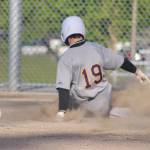 Heather Spaulding Staff photo
Freshman Joseph Holt comes slides into homeplate.