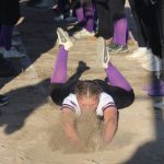 Heather Spaulding \ Staff photo
Senior Ella Raichlan stirs up the dust as she slides into home plate