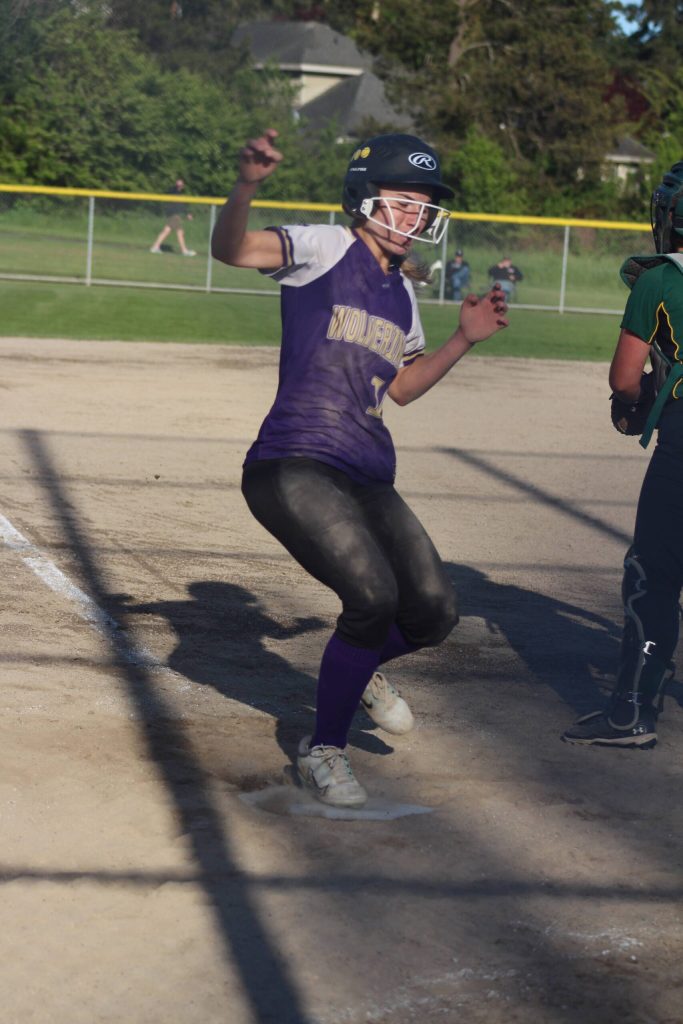 Heather Spaulding \ Staff photo
Wolverines fast pitch makes one last home run for the season.