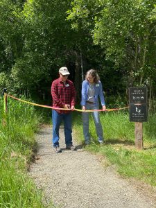 Staff photo / Isabel Ashley
Director of the San Juan County Conservation Land Bank, Lincoln Bormann (left), and Conservation Director of the San Juan Preservation Trust, Vickie Edwards (right), at the ribbon cutting ceremony for the new trail on the Land Banks Cady Mountain Preservation