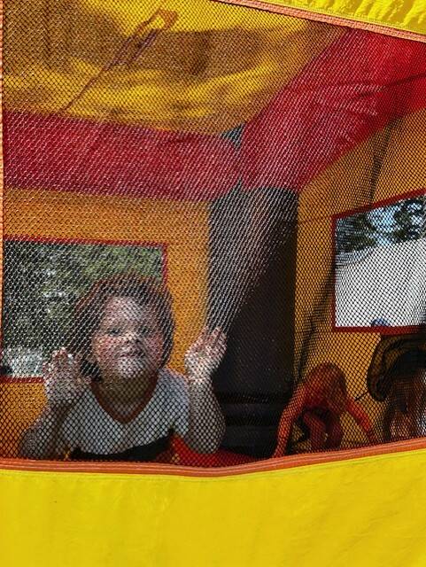 Heather Spaulding \ Staff photo
 One attendee enjoys the bouncy house.