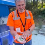 Colleen Smith Summers photo.
ORS board treasurer Jim Duff Duffield showing some of the crushed glass, which can be used in landscapes and gardens.