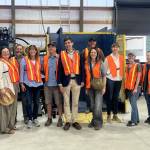 Colleen Smith Summers photo.
Left to right: Greg Sawyer of San Juan County; Jessica Hudson SJC; Cindy Wolf SJC Council; Carey Eskridge, Orcas Chamber; Kendra Smith, SJC; Pete Moe, Exchange; State Rep. Alex Ramel; Troy Lautenbach, Lautenbach Recycling; Katie Fleming, SJC; Krista Bouchey, OPALCO; Carolyn Moulton, Lautenbach Recycling; Angela Broderick, SJC; Jon Gratch, Exchange Board.