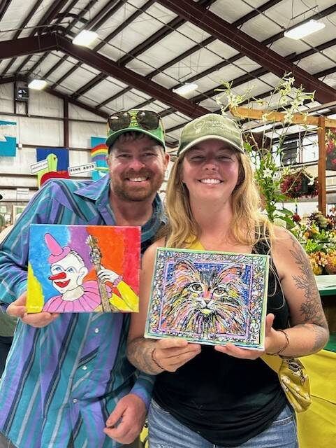 Heather Spaulding \ Staff photo
Two of the SJIMA raffle winners.