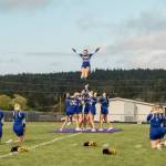 Contributed photo by Aiden Haines
On the field taking a knee on the left side: Chase Lee and Chloe Roach Stunt Group: Elizabeth Ockerman (front spot), Paloma Waldron (main base), Kimberly Ponce (left support), Paige Carlton Flierl (flyer/ top girl), Samantha Ponce (back spot), Jillian Otis (side base), Liliana Carrillo (right support) On the field taking a knee on the right side: Brandy Lawson and Madison Ockerman