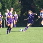 The Wolverines pass the ball down field.