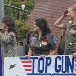 Heather Spaulding Staff photo
Seniors hold up their Top Gun banner on their float.