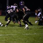 Contributed photo by John Stimpson
Wolverine #28, Marcos Soto, tackles Tiger running back.