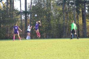 Contributed photos by Robert Rainier Spaulding
The Wolverines get control of the ball via head shot Oct. 24.
