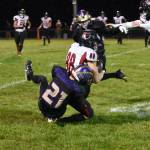 Contributed photo by John Simpson
Wolverine #21 Jaden Harrison stops Wolves running back.