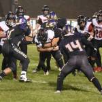 Contributed photo by John Simpson
Wolverines wrap up Wolves runner.