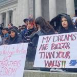 Protesters held up signs in support of Latino culture and immigrants to the United States. Mary Feusner photo.