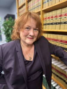 Contributed photo
Carla Higginson amongst the law books.