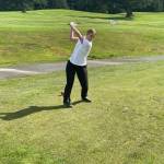 Contributed photo
Morgan Douglass tees off at the first match of the season.