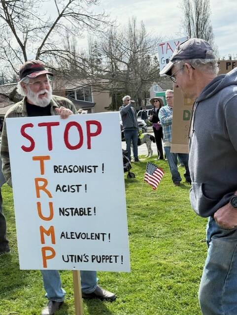 Heather Spaulding \ Staff photo
More attendees with signs.