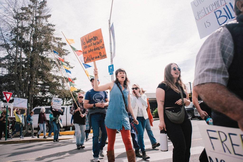 contributed photo by Chase Anderson
Hundreds of islanders marched up Spring Street.
