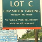 Lot C sign with Amazon Trucks