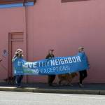 Heather Spaulding \ Staff photo
The Quakers carried a Love Thy Neighor banner.