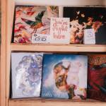 The Fold is filled with posters, records, books, and art from those who visit or perform.