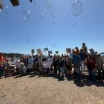 Heather Spaulding \ Staff photo
Islanders after making a heart in the sand at Jacksons Beach July 17.