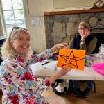 Contributed photo
Sarah Severn shows off a necklace repair by Cady Davies.