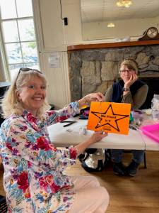 Contributed photo
Sarah Severn shows off a necklace repair by Cady Davies.