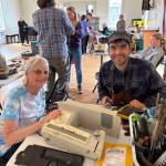 Contributed photo
Guisepi Spadafora works on a broken sewing machine for Jill Patton.