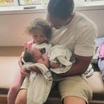 Justice, Norah, and baby Arlo the day he was born