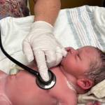 Baby Arlo being checked at the hospital after his ferry birth