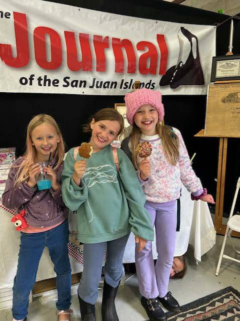 Staff photo \ Kristina Stucki
Georgia, Charlotte Arrowsmith and Harmony Hall at the Journal booth.