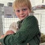 Staff photo Heather Spaulding
A duck and his boy, James Schulz.