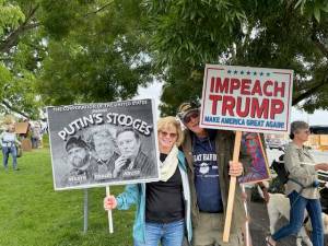 Staff photos / Heather Spaulding
Karen and Norris Palmer displaying their signs.