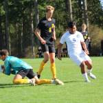 Wolverines goalie protects the ball during the Oct. 2 game at Linde Fields.
