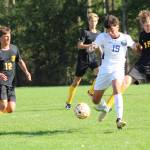 Heather Spaulding Stasff photo
Wolverines attempt to steal the ball from the Vikings during the Oct. 2 game.