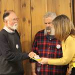 Heather Spaulding photo
Library Director Laurie Orton, Steering Committee member Steve Ulvi and Steve Bowman at the meeting.