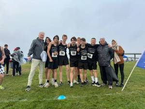 Darrell Kirk photo
The Wolverines Boys Cross Country team at the West Central WIAA District 3 on Nov. 1