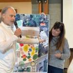 Heather Spaudling/staff photo.
Representatives from one table talk about the map they created.