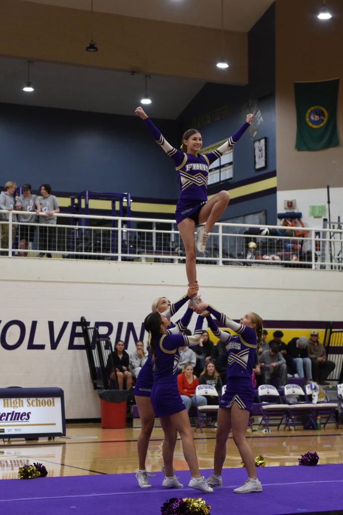 John Stimpson photo.
Wolverine Cheer team keeps spirits up.