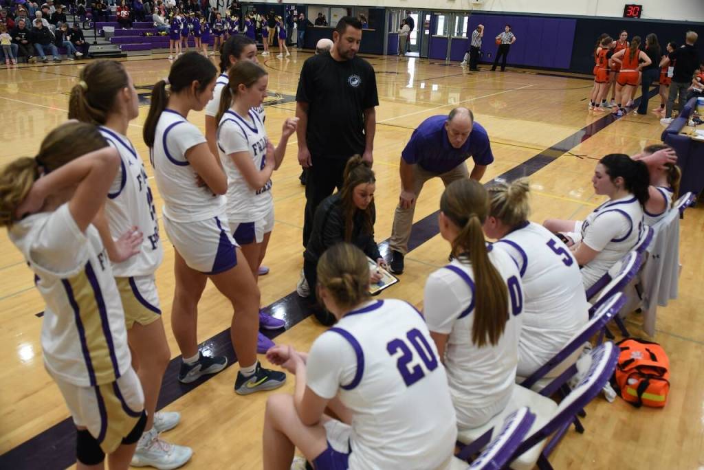 Contributed photo by John Stimpson
Coach Mandy Baker describes the winning play.