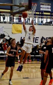 Contributed photo by John Stimpson
Wolverine #5 Channing Kleine sails in for two points