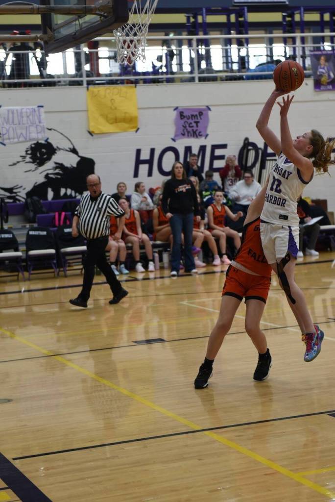 Contributed photo by John Stimpson
Wolverine #12 Harper Feliz sinks the first basket.