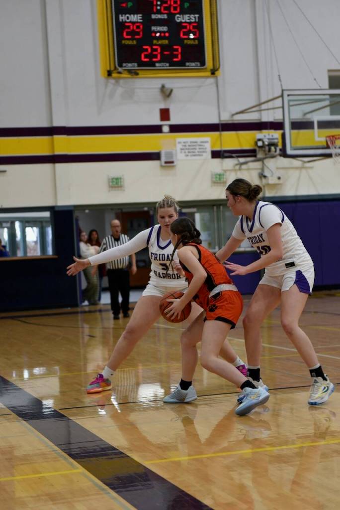 Contributed photo by John Stimpson
Wolverines #5 Lola Clark and Ila Allen provided good defense.