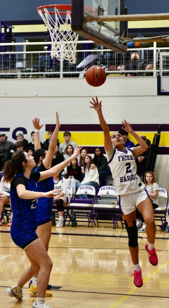 John Stimpson photo.
Atziry Orozco Jimenez, #2, drives the baseline for a two-point score.