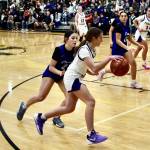 John Stimpson photo.
Lyla Ovenell drives toward the basket.